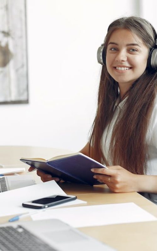 Students create a new project. Girl learning and use the laptop